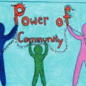 Three colorful figures holding up a sign that reads "Power of Community" on a blue background, symbolizing unity and cooperation.