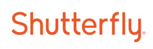 The image shows the Shutterfly logo in orange text on a white background, emphasizing the brand's name. No landmarks or people are present.