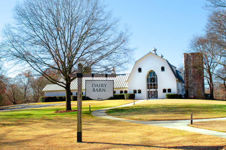 The quaint country Dairy Barn and its sign are pictured.