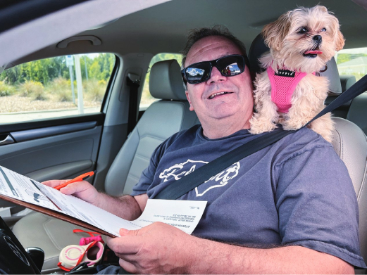 A member and his dog are seen having fun and joking around