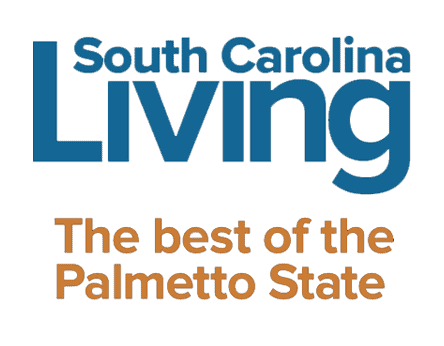 Logo with "South Carolina Living" in blue text and "The best of the Palmetto State" in orange text below, likely magazine or publication cover.